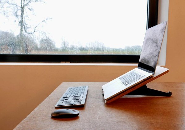 Laptop stand window desk setup